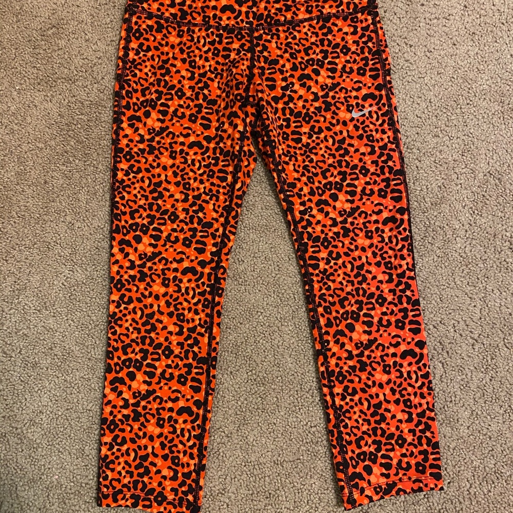 Nike Orange Cheetah Print Cropped Leggings